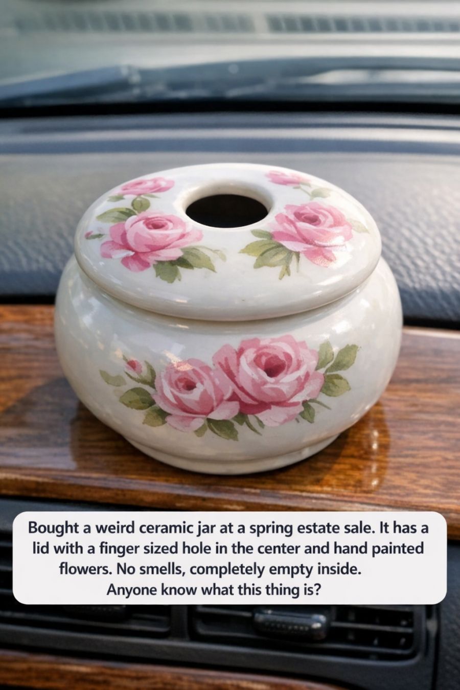 Bought a weird ceramic jar at a spring estate sale. It has a lid with a finger sized hole in the center and hand painted flowers. No smells, completely empty inside. Anyone know what this thing is?